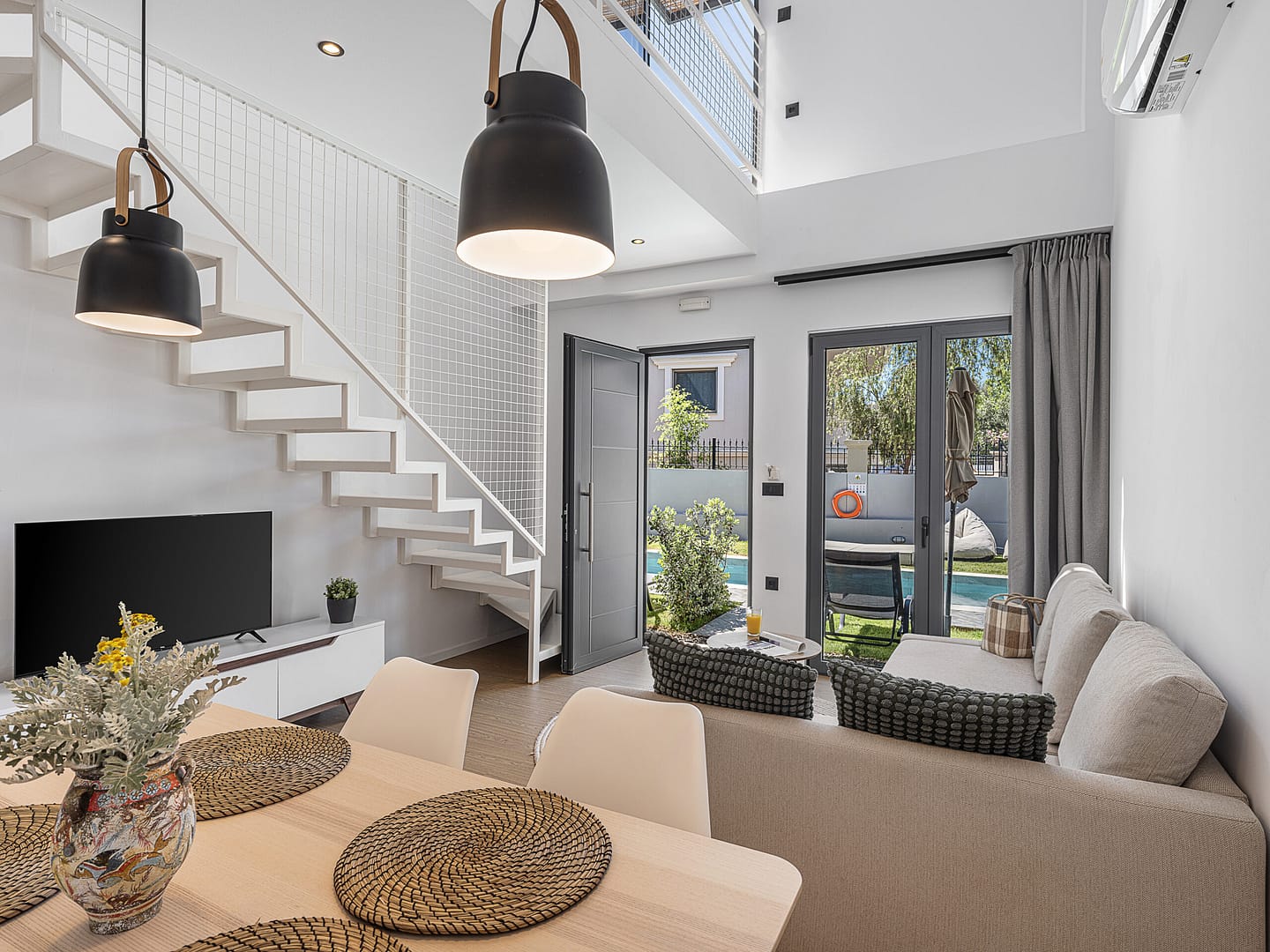 Living room and entrance.
